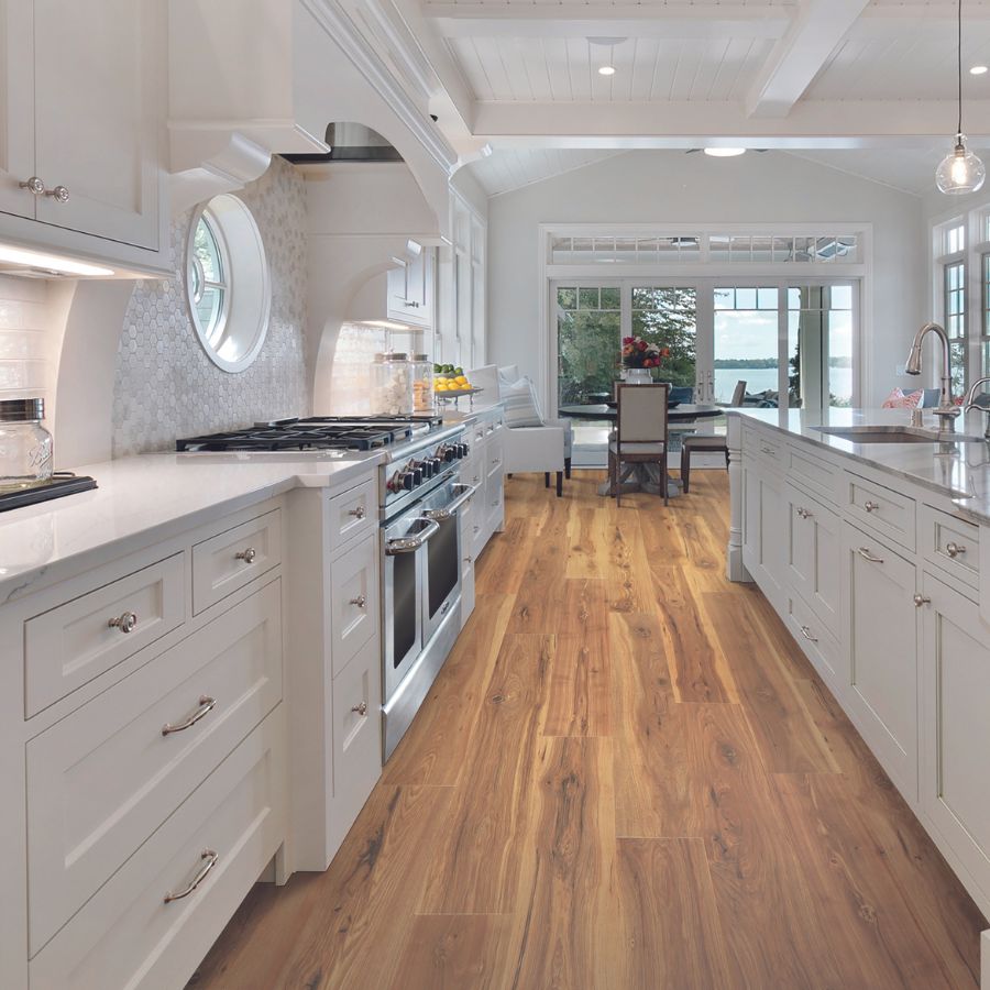 wood-look laminate in kitchen, white furniture, dining table, big window, white countertop